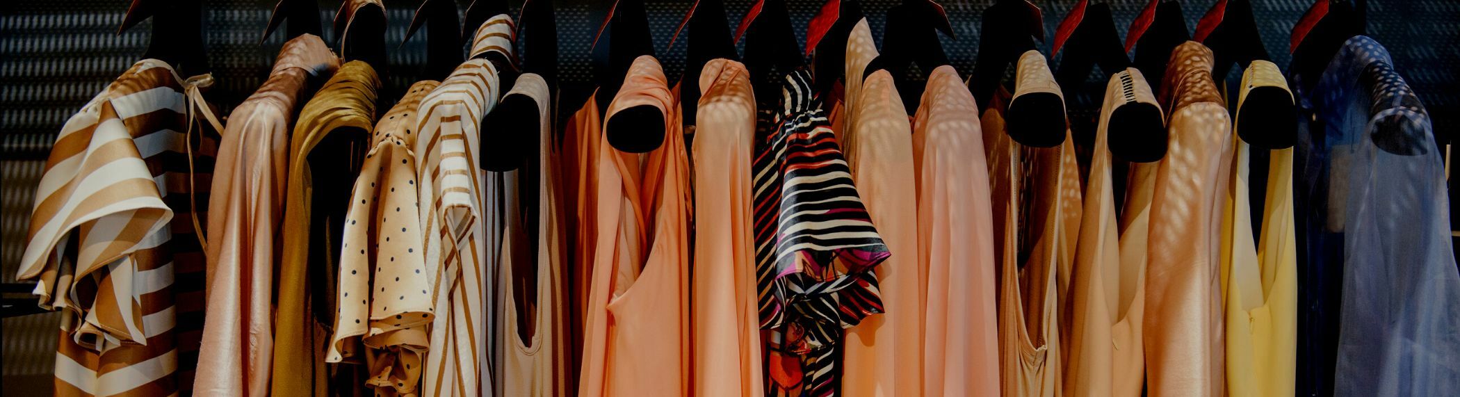 A clothing rack with women's clothes